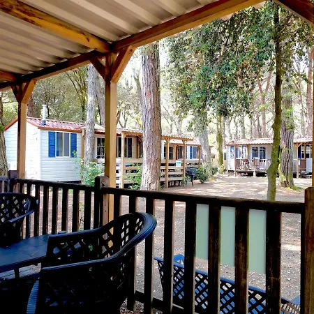 Dena Chalets - At The *