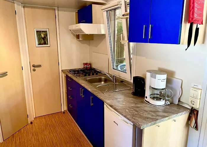 Dena Chalets - At The *